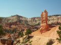 The trail meanders below a large hoodoo.jpg